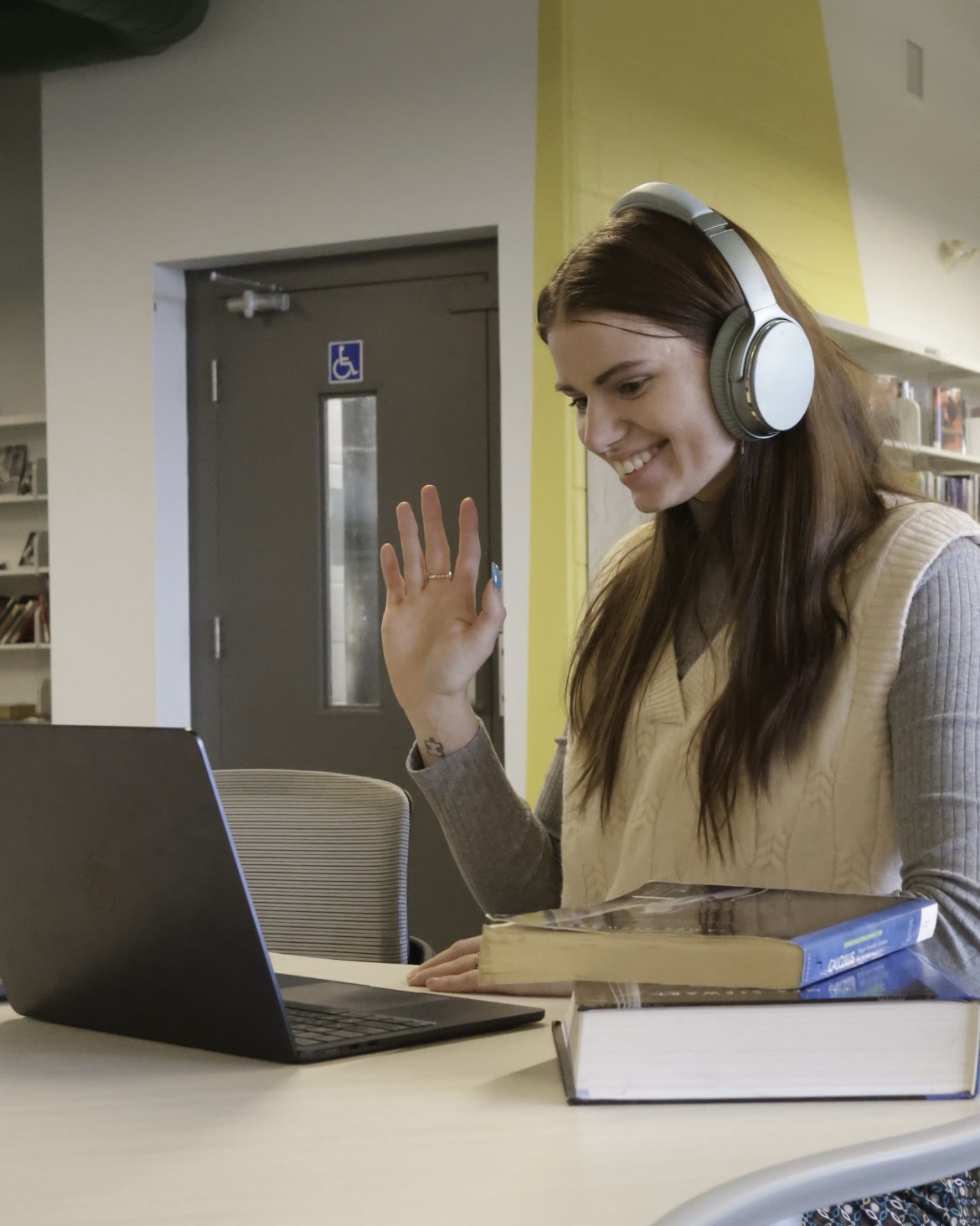 Liv smiling during an online tutoring session